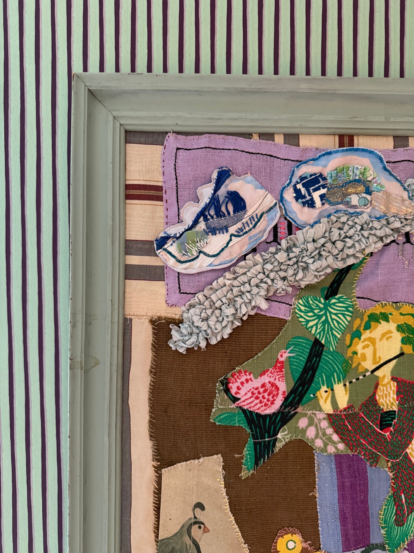 TAPESTRY IN LIGHT GREEN FRAME BOY PLAYING FLUTE - CRÈME de la CRÈME à la HELLE